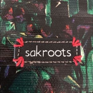 Small cross body or wristlet by Sakroots